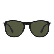 Klassiske sorte solbriller med grønne linser