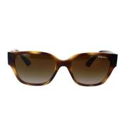Stilfulde solbriller med mørk Havana-ramme og brune gradientlinser