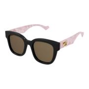 Kvadratiske feminine sorte og marmorrosa solbriller