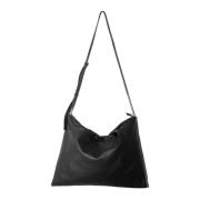 Rektangulær sort lædertaske med lynlås