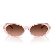 Ovale solbriller med pink gradient linse