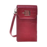 Mobile phone holder in red quilted leather with monogram