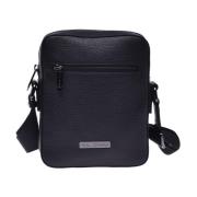 Crossbody bag in black tumbled leather