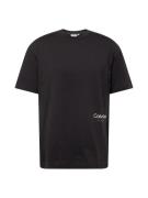 Calvin Klein Bluser & t-shirts 'Off Placement'  sort / hvid