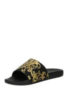 Versace Jeans Couture Pantoletter 'SHELLY'  guld / sort