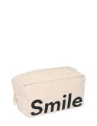 Cavita. Travel Wash Bag Design Letters Cream