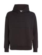Comfort Debossed Logo Hoodie Tops Sweatshirts & Hoodies Hoodies Black ...