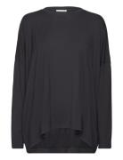 Carro Tops T-shirts & Tops Long-sleeved Black Movesgood