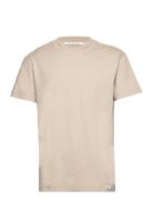 Woven Tab Tee Tops T-Kortærmet Skjorte Cream Calvin Klein Jeans