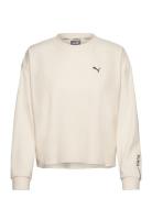 Unwind Pullover Sport Sweatshirts & Hoodies Sweatshirts Beige PUMA