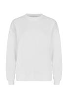 Iconic Sweatshirt Sport Sweatshirts & Hoodies Sweatshirts White Röhnis...