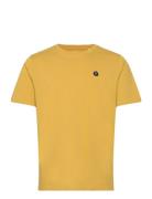 Loke Badge Tee - Regenerative Organ Tops T-Kortærmet Skjorte Yellow Kn...