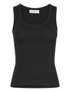 Cmsiv-Top Is A Tight-Fitting Top In A Thick And Stretchy Material With...