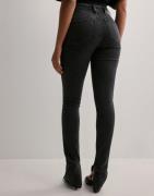 Calvin Klein Jeans - Sort - High Rise Super Skinny